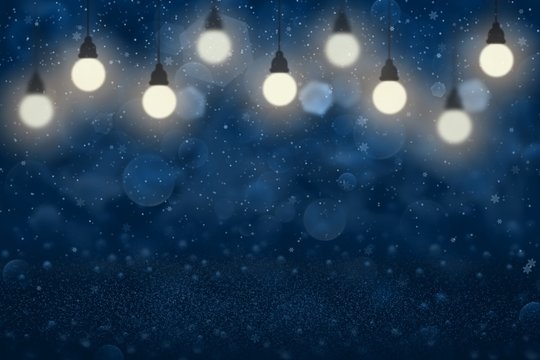blue nice glossy glitter lights defocused bokeh abstract background with light bulbs and falling snow flakes fly, holiday mockup texture with blank space for your content © Dancing Man