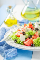 Diet Greek salad with tomatoes, lettuce and feta cheese