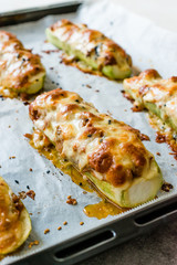 Baked Zucchini Courgettes Stuffed with Cheese and Dill.