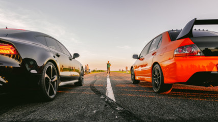 sport car at the start, speed competition, drag racing, high speed
