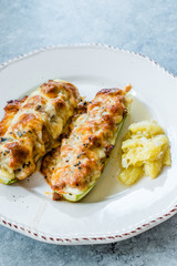 Baked Zucchini Courgettes Stuffed with Cheese and Dill.