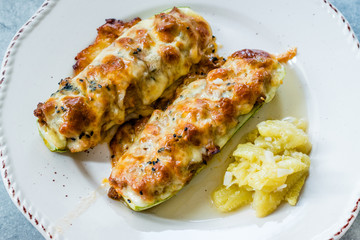Baked Zucchini Courgettes Stuffed with Cheese and Dill.