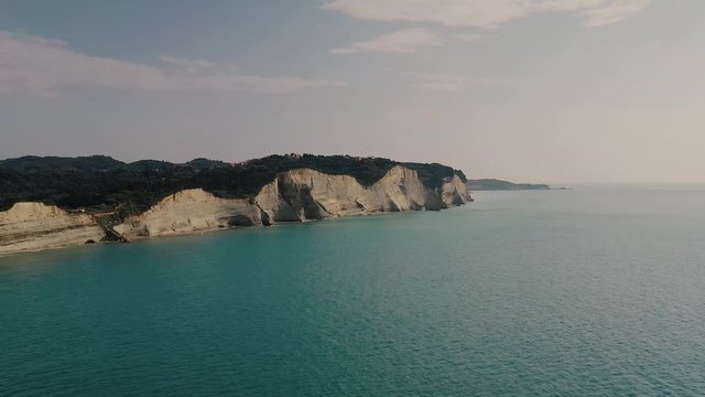 Aerial shot of Cliffs in Logas beach Peroulades, Greece