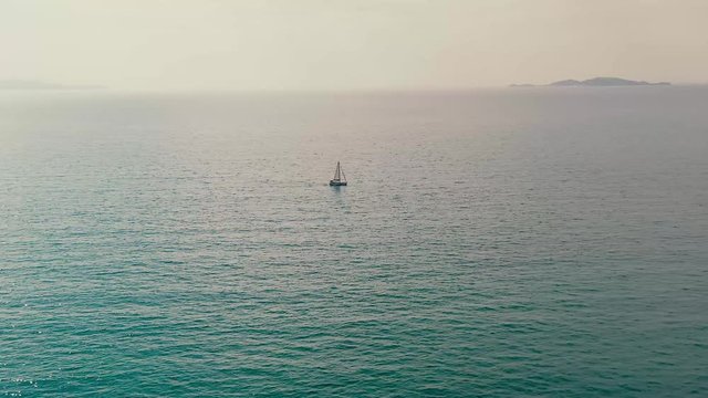 Aerial view Yacht Sailing On Open Sea Logas beach, Greece