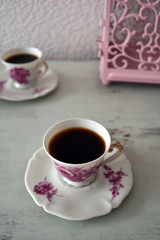 Coffee in vintage porcelain cups