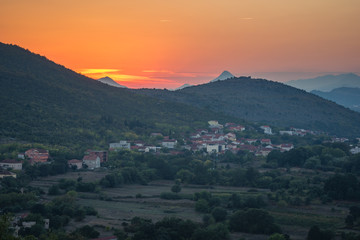 Fototapeta na wymiar Sunset over the Dinaric Alps in Medjugorje, Bosnia and Herzegovina
