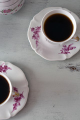 Coffee in vintage porcelain cups