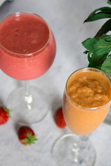 smoothies in a glass on a white background