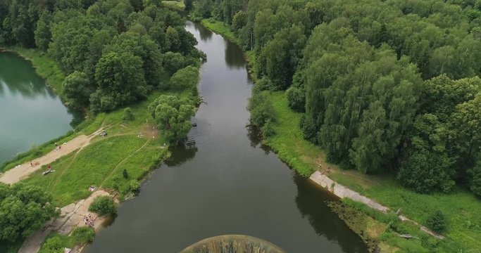 Yaropolets near Volokolamsk (Moscow Region), Russia. Old Yaropoletskaya water-power plant and Volokolamskiy waterfall. The first hydroelectric power station in the USSR. Aerial 4K 60 fps.