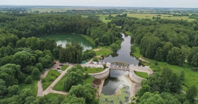 Yaropolets near Volokolamsk (Moscow Region), Russia. Old Yaropoletskaya water-power plant and Volokolamskiy waterfall. The first hydroelectric power station in the USSR. Aerial 4K 60 fps.
