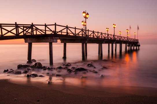Early hours of daylight on the beach of Marbella on the Costa de Sol (Malaga) Spain