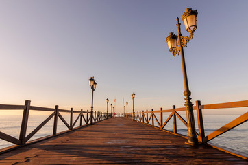 Obraz premium Early hours of daylight on the beach of Marbella on the Costa de Sol (Malaga) Spain