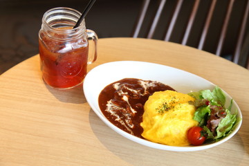 Japanese Cuisine Omuhayashi. It's a combination of Hashed beef rice called 'Hayashi rice' and  omelet with a filling of ketchup‐ seasoned fried rice called 'Omurice'.
