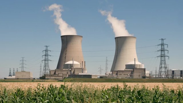 Doel Nuclear Power Station with two smoking cooling towers