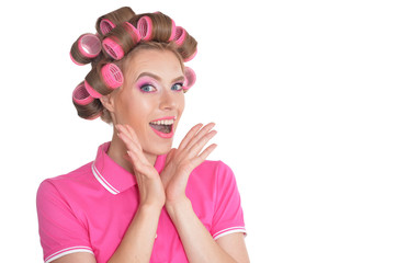 Portrait of beautiful woman with hair curlers