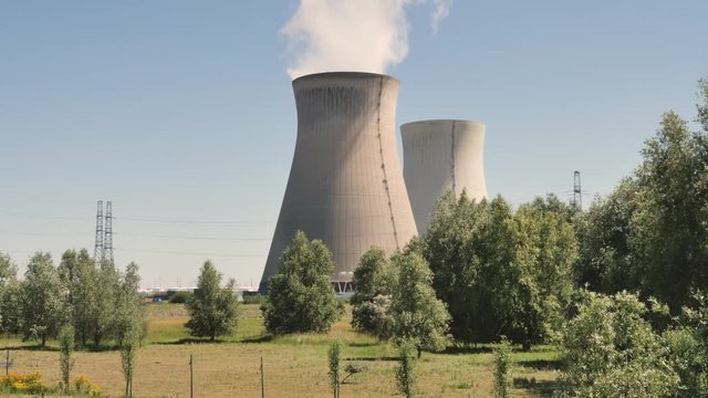 Doel Nuclear Power Station with smoking cooling towers