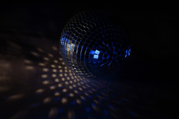 beautiful disco ball on yellow background isolated.