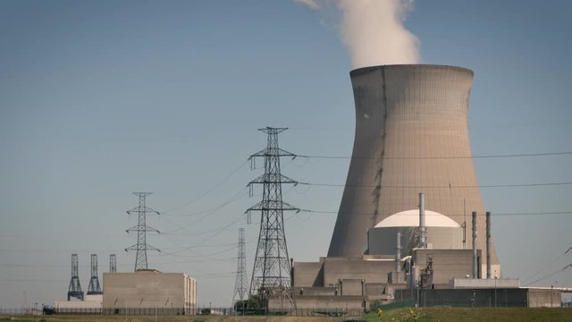 Doel Nuclear Power Station with smoking cooling towers