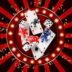 Obraz premium The word Casino, surrounded by a luminous frame and attributes of gambling, on a explosion background.