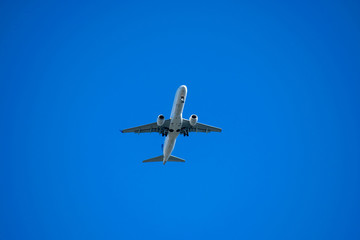 Fototapeta na wymiar Passenger aircraft in the sky going to land.