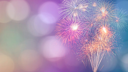 Colorful firework with bokeh background with copy space for New Year celebration, Abstract holiday...