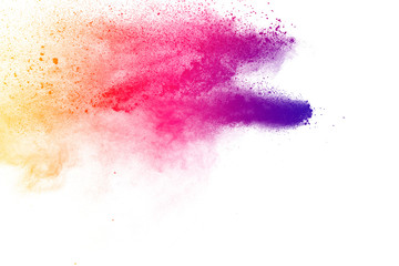 Colorful powder explosion on white background. Abstract pastel color dust particles splash.