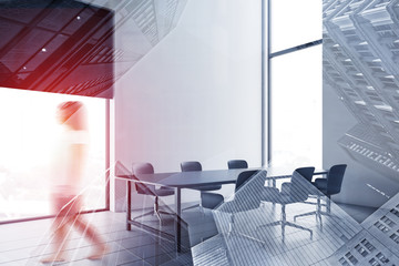 Woman walking in white dining room