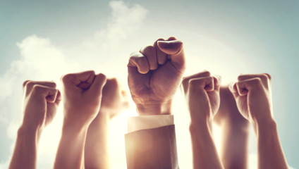 Hands of Business team raised fist air Corporate Celebration victory, success and winning concept....