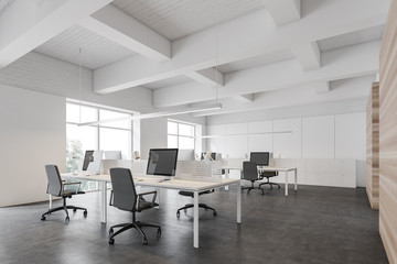 White and wooden open space office corner