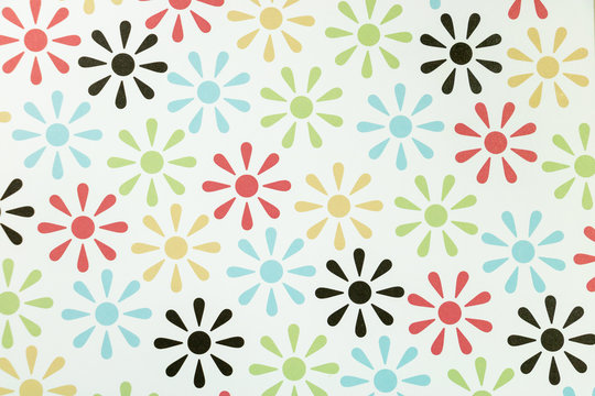 Arrière plan fleurs stylisées très colorées représentatives des années 70
