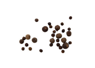 Scattered allspice and pepper isolated on white background