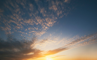 Grey clouds in the blue sky