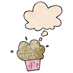 cartoon cupcake and thought bubble in grunge texture pattern style