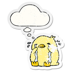 cartoon crying bird and thought bubble as a distressed worn sticker