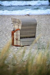 wooden chair on the beach