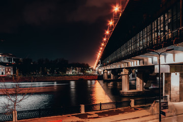 Fototapeta na wymiar Bridge at night in Moscow