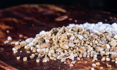 Pumice pebble close up on wooden background