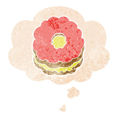 cartoon biscuit and thought bubble in retro textured style