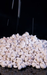 Close up Pumice pebbles  on blacl background