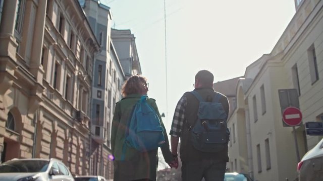 city, couple, walking, travel, people, woman, young, urban, happy, tourist, girl, beautiful, vacation, street, europe, summer, lifestyle, caucasian, fun, new, person, european, friends, female, backgr