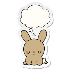 cute cartoon rabbit and thought bubble as a printed sticker