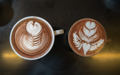 Cup of hot coffee with latte art