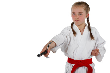 Tweenage girl going karate