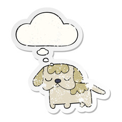 cute cartoon puppy and thought bubble as a distressed worn sticker