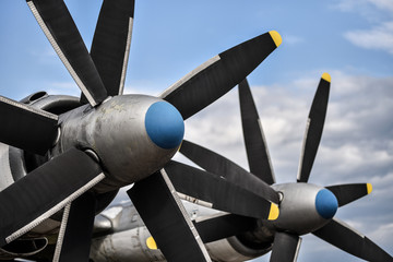 propellers of heavy military airplane close up