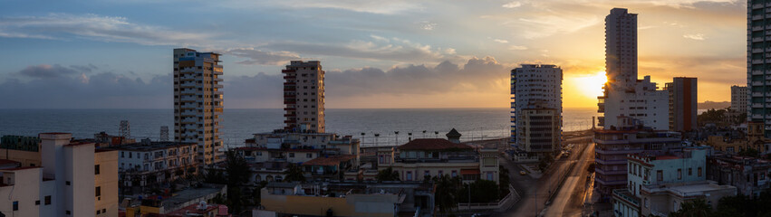 Aerial panoramic view of the residential neighborhood in the Havana City, Capital of Cuba, during a colorful sunrise.