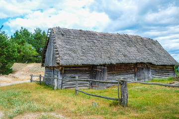 Folk abandoned oldest habitation under a reed roof in the disappearing village of Svalovichi in the Ukraine. Ukrainian Polissya.