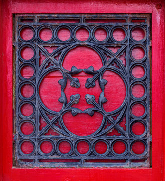 Cast iron lattice on a medieval door
