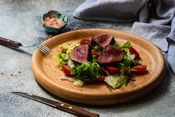 Steak salad with fresh lettuce