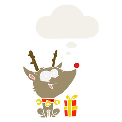 cartoon christmas reindeer and thought bubble in retro style
